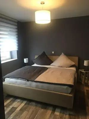Ein Bett oder Betten in einem Zimmer der Unterkunft deinFerienhaus Scheliga „Midi“