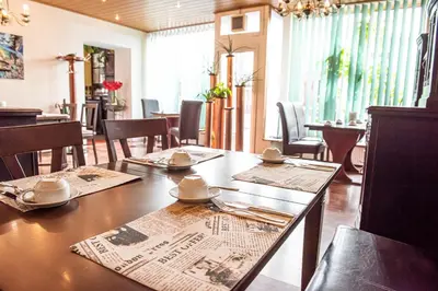 Ein Sitzbereich in der Unterkunft Neubert`s Gasthaus am Rhein