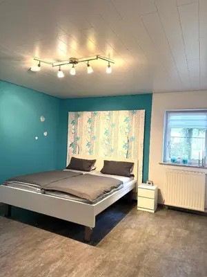 Ein Bett oder Betten in einem Zimmer der Unterkunft Ferienwohnung Haus Angela