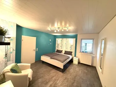 Ein Bett oder Betten in einem Zimmer der Unterkunft Ferienwohnung Haus Angela