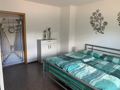 Ein Bett oder Betten in einem Zimmer der Unterkunft Rhein - Mosel Quartier 4