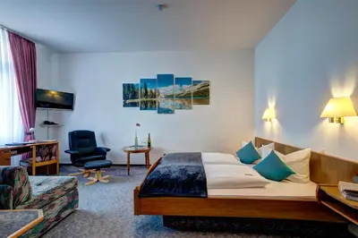 Ein Sitzbereich in der Unterkunft Paulin Hotel Trier