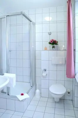 Ein Badezimmer in der Unterkunft Paulin Hotel Trier