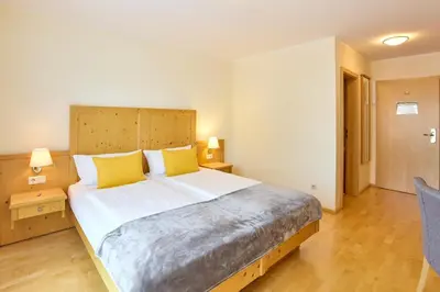 Ein Bett oder Betten in einem Zimmer der Unterkunft Airport-Hotel Fortuna