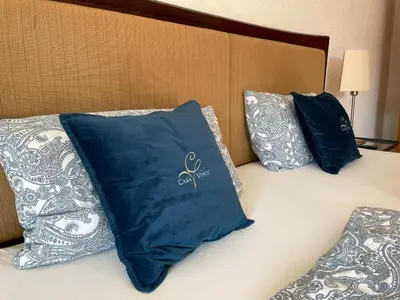 Ein Bett oder Betten in einem Zimmer der Unterkunft Hotel Casa Verde