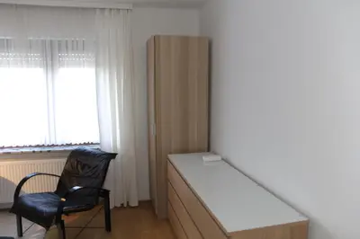 Ein Bett oder Betten in einem Zimmer der Unterkunft Bike and Hike Ferienhaus Kolverath