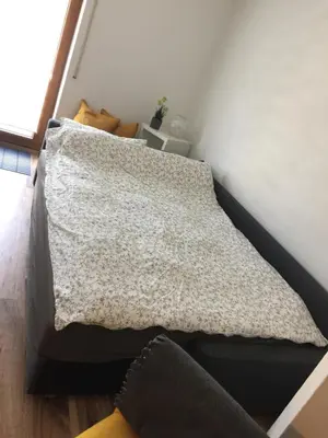 Ein Bett oder Betten in einem Zimmer der Unterkunft Ferienwohnung Katrin