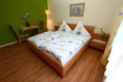 Ein Bett oder Betten in einem Zimmer der Unterkunft Weingut Bollig-Prüm