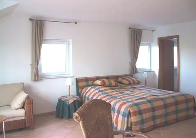 Ein Bett oder Betten in einem Zimmer der Unterkunft Weingut Fries