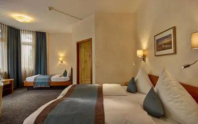Ein Bett oder Betten in einem Zimmer der Unterkunft Trip Inn Hotel Hamm