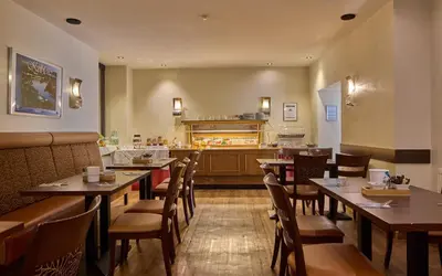 Ein Restaurant oder anderes Speiselokal in der Unterkunft Trip Inn Hotel Hamm