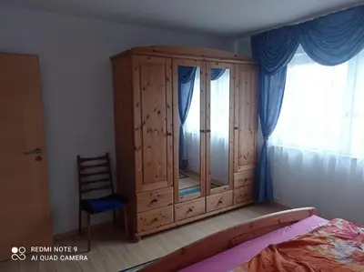 Ein Bett oder Betten in einem Zimmer der Unterkunft Ferienwohnung Idarblick