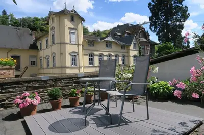 Ein Garten an der Unterkunft Ferienwohnung Heuser