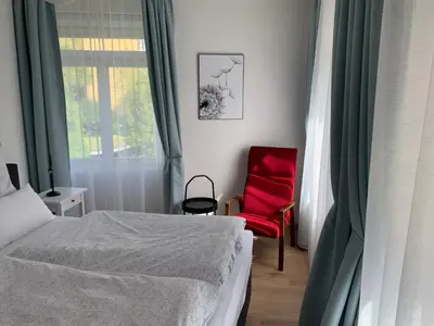 Ein Bett oder Betten in einem Zimmer der Unterkunft Ferienwohnung Heuser