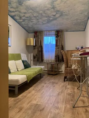 Ein Sitzbereich in der Unterkunft Ferienwohnung Brenderweg