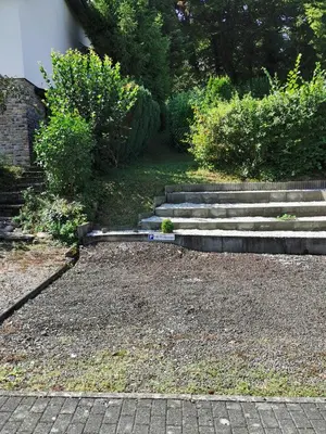 Ein Garten an der Unterkunft Ferienwohnung Moselpanorama