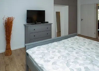 Ein Bett oder Betten in einem Zimmer der Unterkunft The Rocks - Ferienwohnung mit Felsenpanorama