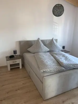 Ein Bett oder Betten in einem Zimmer der Unterkunft Auf der Traumschleife
