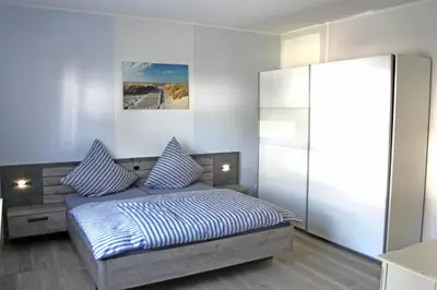 Ein Bett oder Betten in einem Zimmer der Unterkunft Ferienwohungen Arnold Boppard