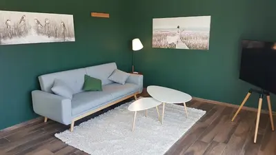 Ein Sitzbereich in der Unterkunft Timeout Lodges - Luxus für Zwei