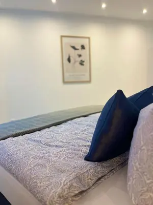 Ein Bett oder Betten in einem Zimmer der Unterkunft Ferienwohnung Bloom