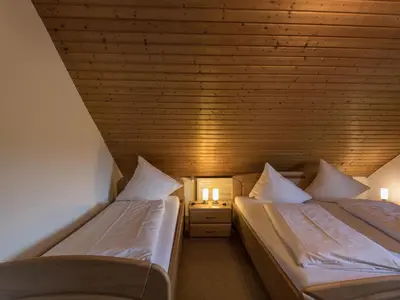 Ein Bett oder Betten in einem Zimmer der Unterkunft Apartment Eifelnatur - Haus 1-3 by Interhome