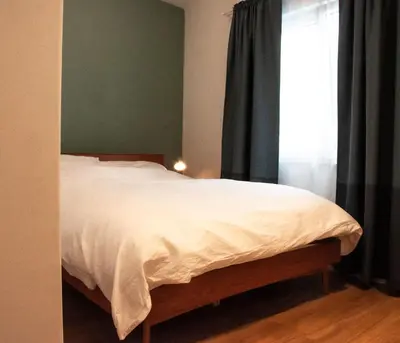 Ein Bett oder Betten in einem Zimmer der Unterkunft Ferienwohnung Marianne