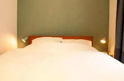 Ein Bett oder Betten in einem Zimmer der Unterkunft Ferienwohnung Marianne