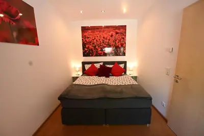 Ein Bett oder Betten in einem Zimmer der Unterkunft Ferienhaus-Heckelmann Diefenbach