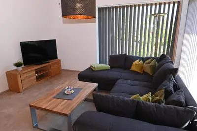 Ein Sitzbereich in der Unterkunft Ferienhaus-Heckelmann Diefenbach