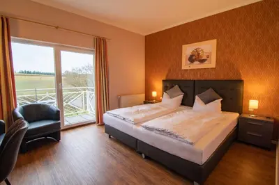 Ein Bett oder Betten in einem Zimmer der Unterkunft Zur Morschbach