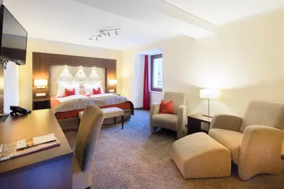 Ein Bett oder Betten in einem Zimmer der Unterkunft Boutique Hotel Villa Melsheimer
