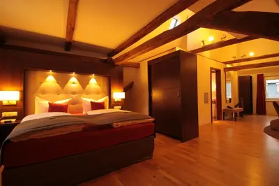Ein Bett oder Betten in einem Zimmer der Unterkunft Boutique Hotel Villa Melsheimer