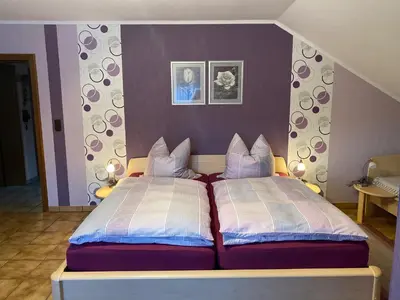 Ein Bett oder Betten in einem Zimmer der Unterkunft Pension Görgen