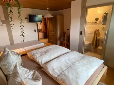 Ein Bett oder Betten in einem Zimmer der Unterkunft Pension Görgen