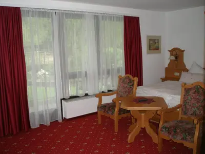 Ein Bett oder Betten in einem Zimmer der Unterkunft Landhotel am Wenzelbach