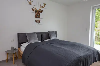 Ein Bett oder Betten in einem Zimmer der Unterkunft Ahr-Palais