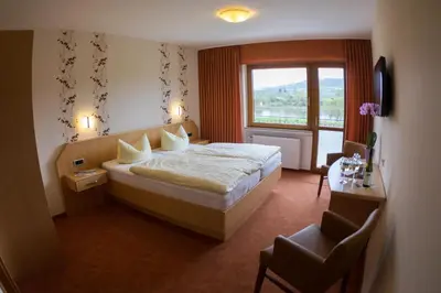 Ein Bett oder Betten in einem Zimmer der Unterkunft Hotel Zehnthof
