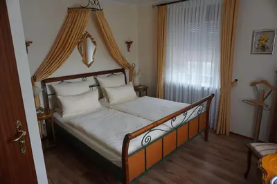 Ein Bett oder Betten in einem Zimmer der Unterkunft Landgasthof “Zur Alten Mühle“