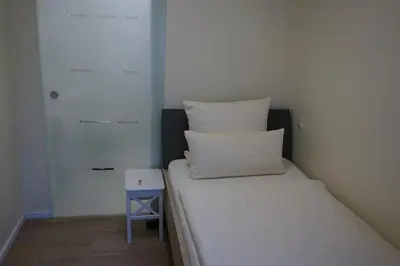 Ein Bett oder Betten in einem Zimmer der Unterkunft Landgasthof “Zur Alten Mühle“