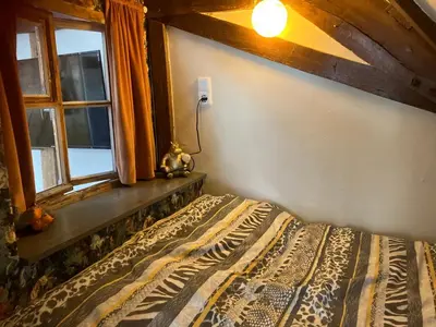 Ein Bett oder Betten in einem Zimmer der Unterkunft Happy Hippo Haus