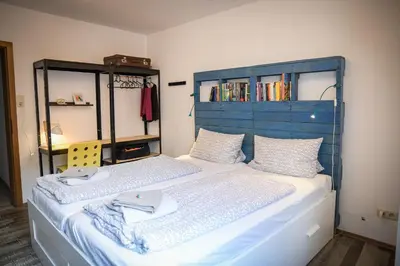 Ein Bett oder Betten in einem Zimmer der Unterkunft Die Schlummerkiste