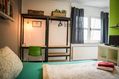 Ein Bett oder Betten in einem Zimmer der Unterkunft Die Schlummerkiste