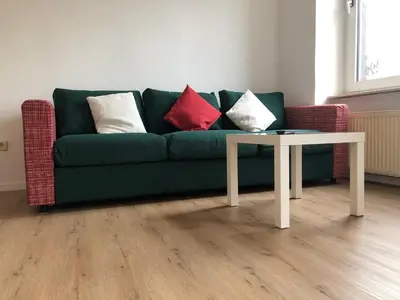 Ein Sitzbereich in der Unterkunft Ferienwohnung Zur alten Schmiede