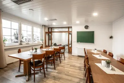Ein Restaurant oder anderes Speiselokal in der Unterkunft Haus Ambros