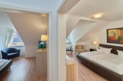 Ein Bett oder Betten in einem Zimmer der Unterkunft Park-Hotel Traben-Trarbach