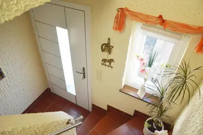 Ein Bett oder Betten in einem Zimmer der Unterkunft Ferienwohnung Auszeit Waxweiler