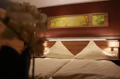 Ein Bett oder Betten in einem Zimmer der Unterkunft Weinhaus Gräfen