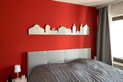 Ein Bett oder Betten in einem Zimmer der Unterkunft Appartment mit Blick auf Schloss Sayn