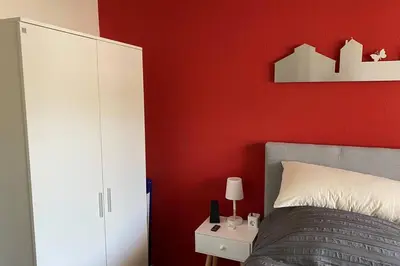 Ein Bett oder Betten in einem Zimmer der Unterkunft Appartment mit Blick auf Schloss Sayn